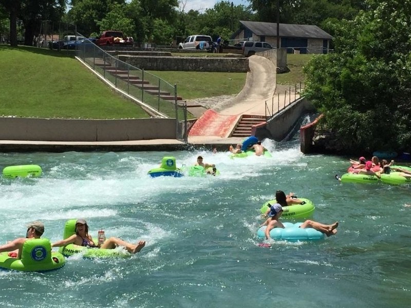 a group of people swimming in the water